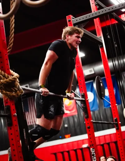FNL-163 Man on bars duirng CrossFit DHF training.