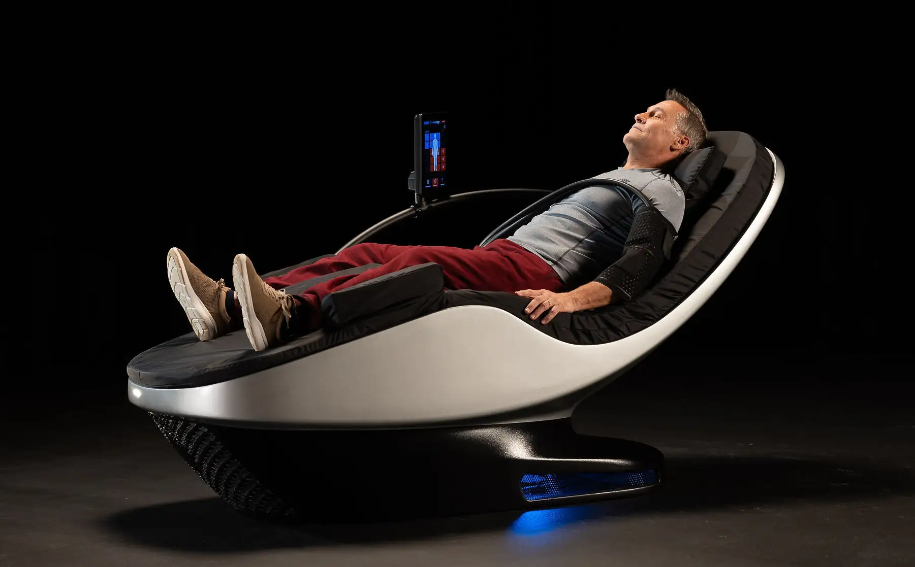 Man relaxing in a Cryo Lounge chair.
