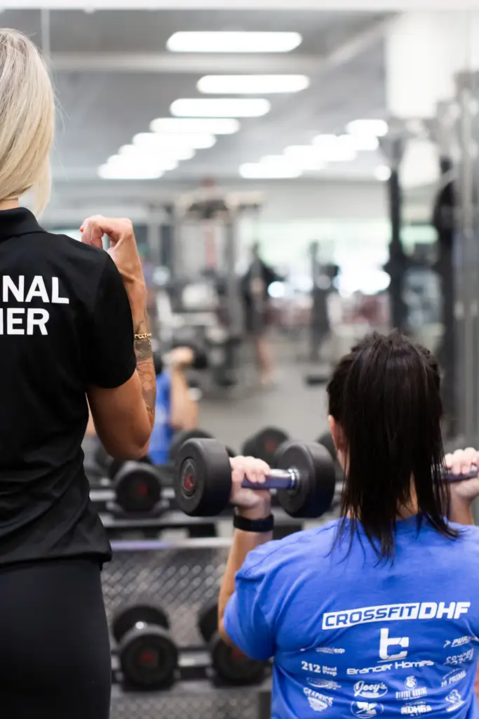 PersonalTraining_3 A female personal trainer working with a female client.