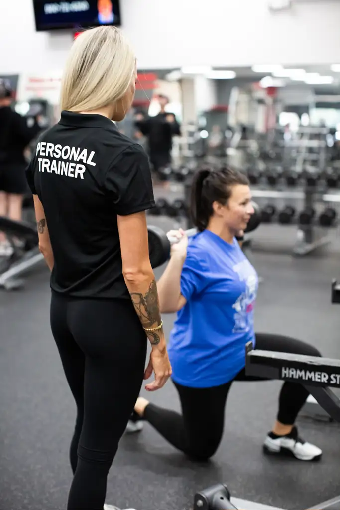 PersonalTraining_4 A female personal trainer working with a female client.