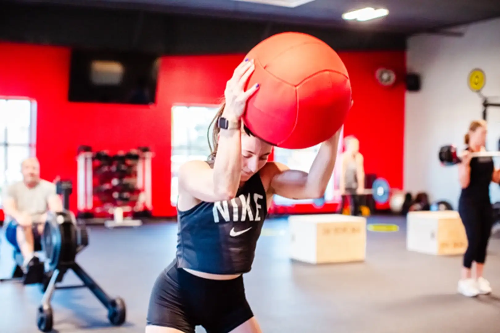 ceremony-les-mills Woman working out with a ball during a Ceremony by Les Mills class.