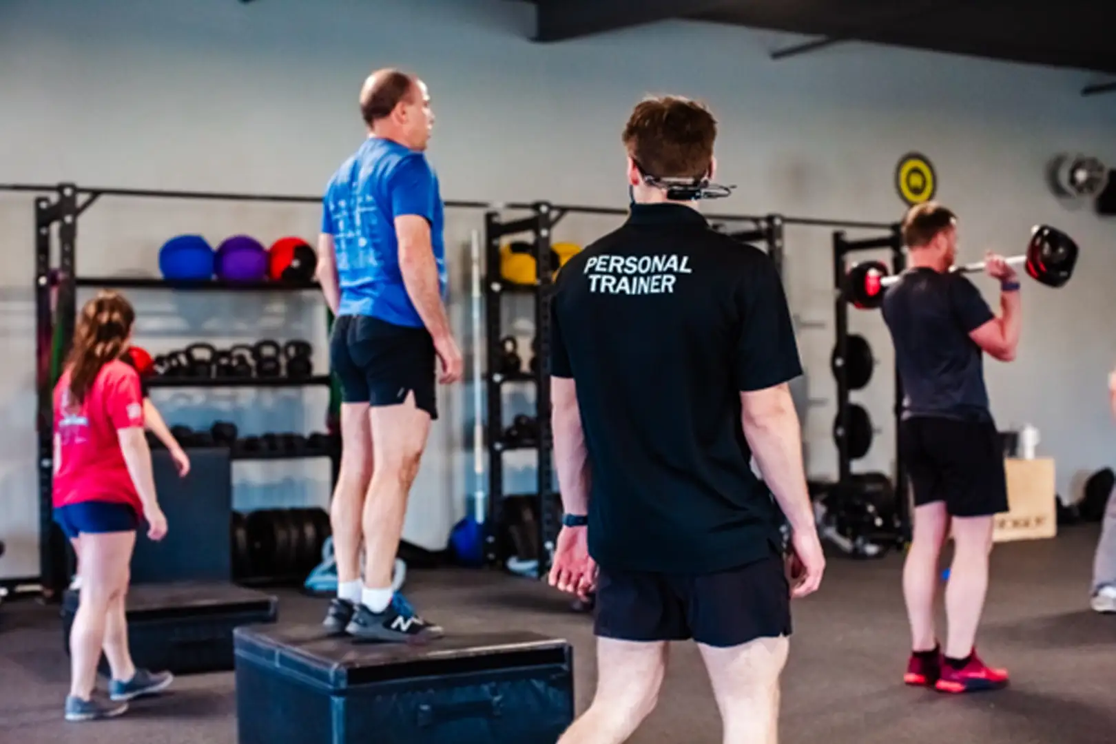 dhf-evolution3 People working out with barbells.